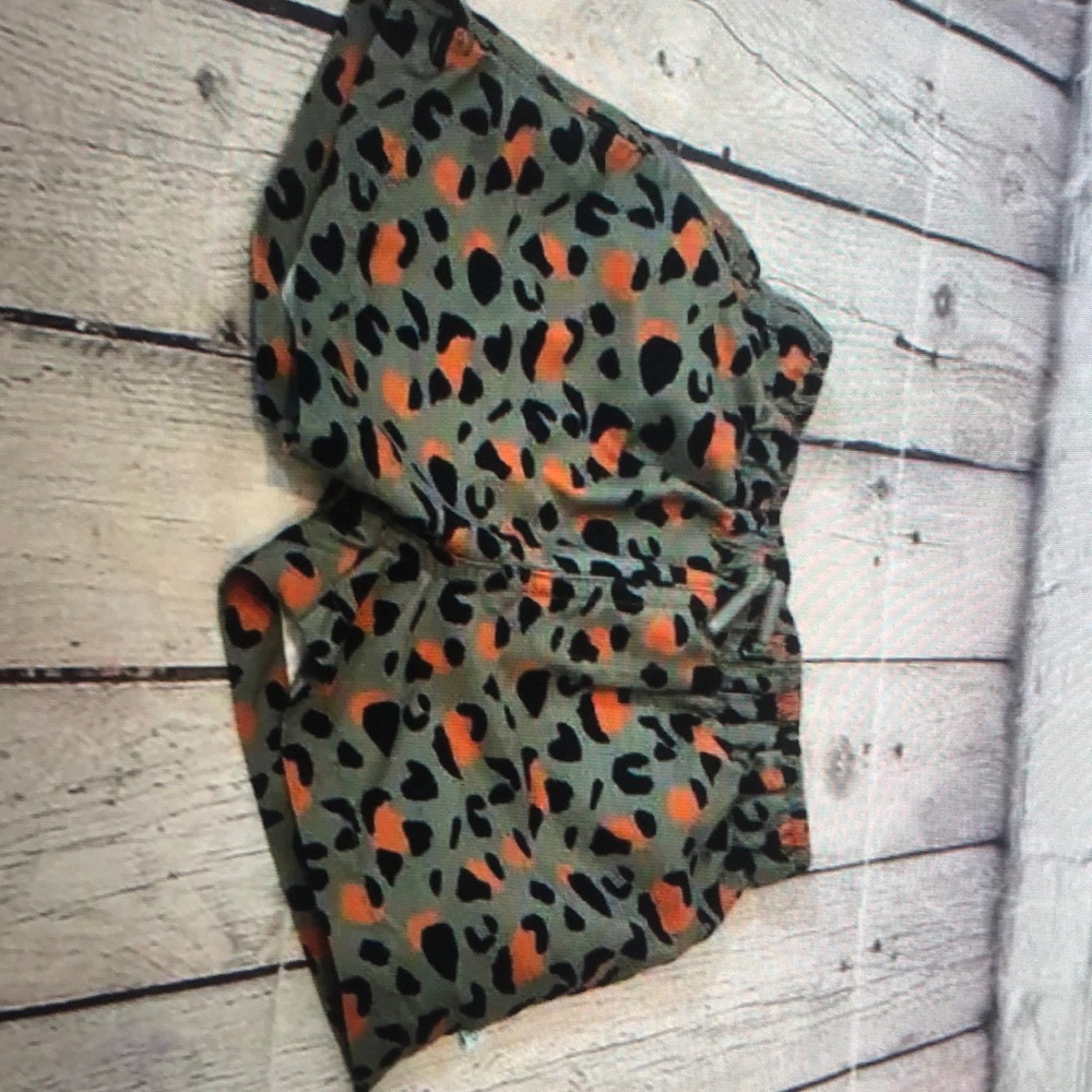 Posh peanut boy’s cheetah print swim trunks